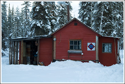 A cabin in the woods in winter, Wrangell-St. Elias National Park, Alaska.