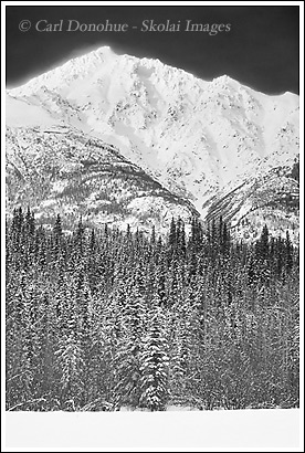 Black and white photo of a mountain, snow-capped, in winter, Crystalline Hills, Wrangell-St. Elias National Park, Alaska.