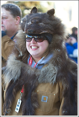 Lady wearing wolf skin, Iditarod start, Anchorage, Alaska.