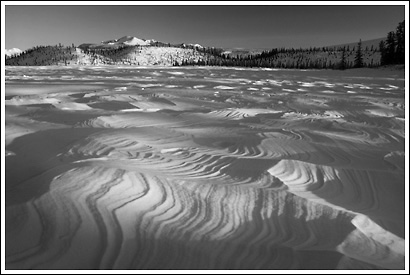Windblow snow patterns over frozen Twin Lakes, near the Nabesna Road, Wrangell-St. Elias National Park, Alaska.