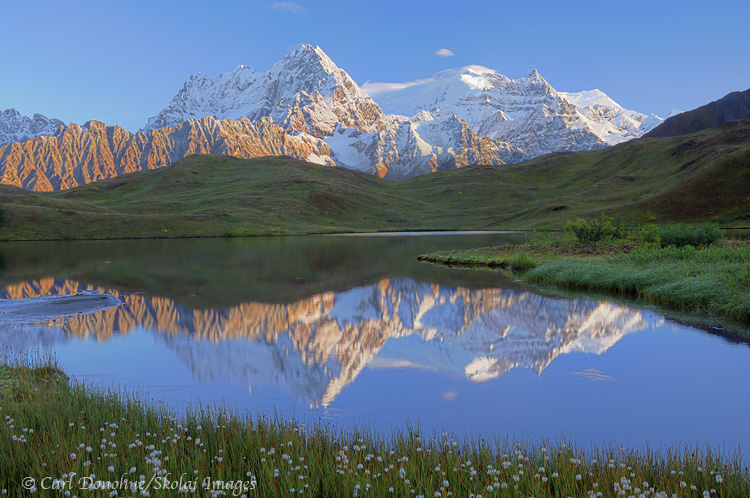 Reflections in the morning, of fresh snow or termination dust on the Wrangell Mountains, near Mount Blackburn, Wrangell-St. Elias National Park and Preserve, Alaska.