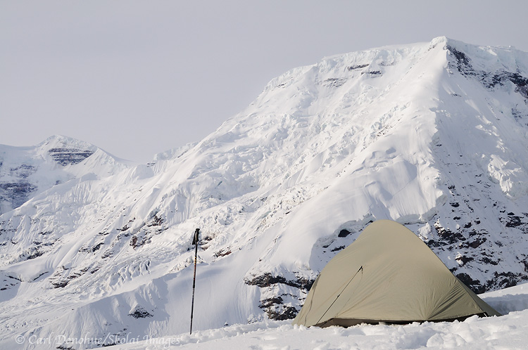 Backcountry campsite, with Big Agnes Seedhouse SL1 tent, facing Mt Jarvis, with fresh snow on the ground, Wrangell-St. Elias National Park and Preserve, Alaska.